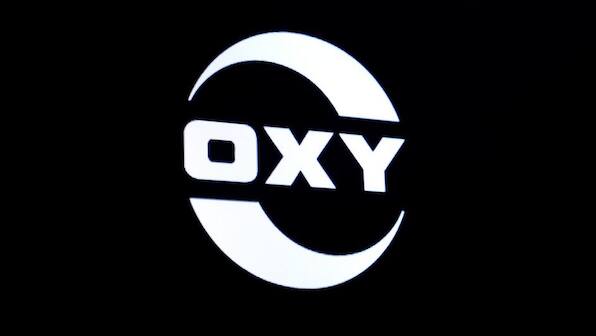 Occidental to slash spending after swinging to loss