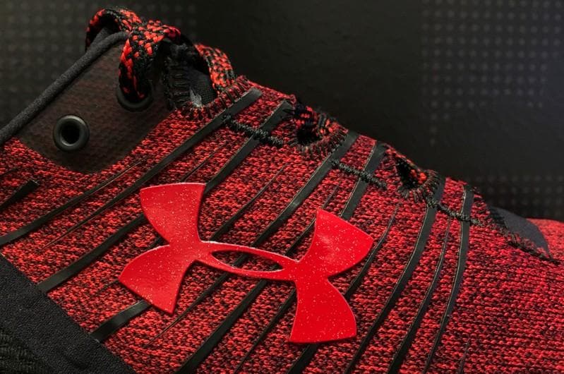 Under Armour cuts revenue forecast federal probe weighs on shares