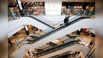 UK consumers keep lid on spending in October - surveys