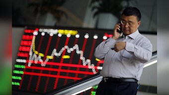 Asian markets tread water as investors await clues on trade