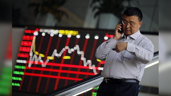 Asian markets tread water as investors await clues on trade