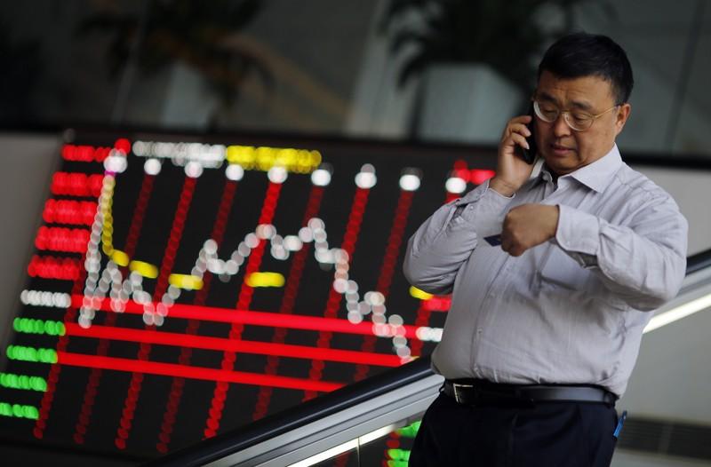 Asian markets tread water as investors await clues on trade Asian markets tread water as investors await clues on trade