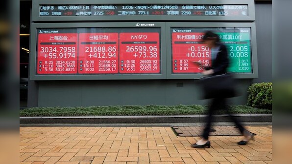 Asia stocks camp near peaks as trade talks drag on
