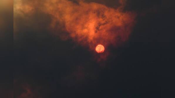 Two people found dead and 100 homes destroyed in Australian bushfires
