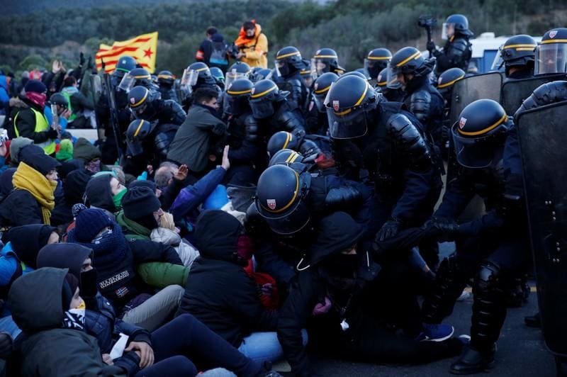 Catalan protesters block major highway that connects with France