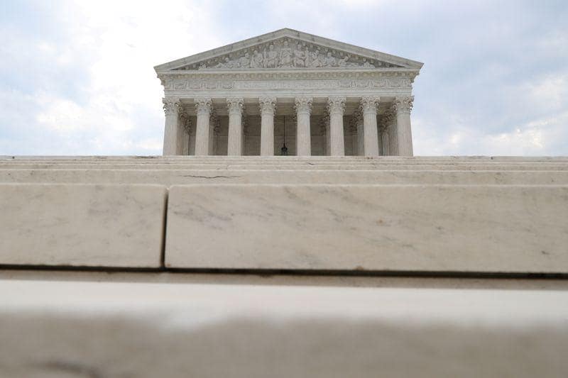 US Supreme Court justices appear unlikely to throw out Obamacare