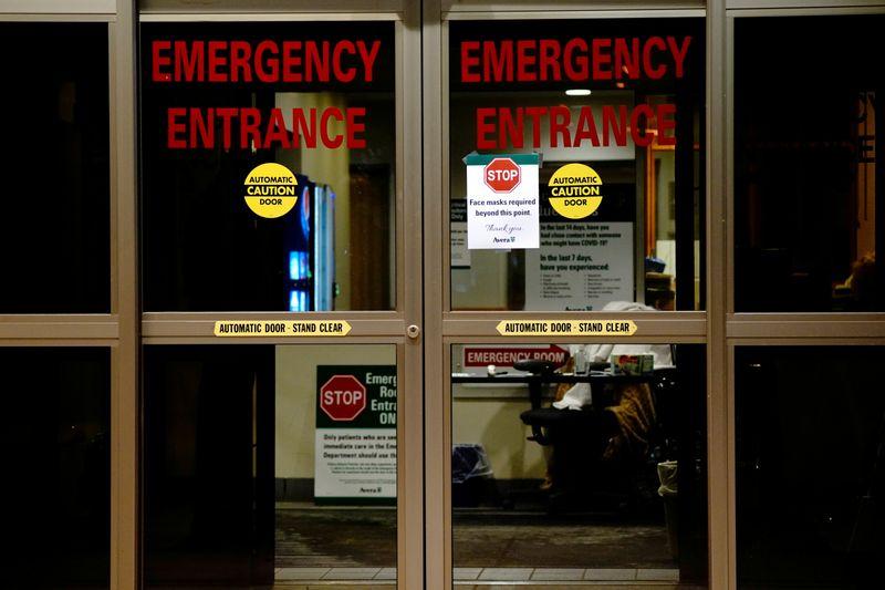 Alarmed by soaring COVID19 hospitalizations some US states tighten curbs