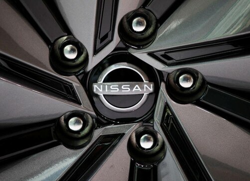 Helped by autos rebound, Nissan trims whopping loss forecast Helped by autos rebound, Nissan trims whopping loss forecast
