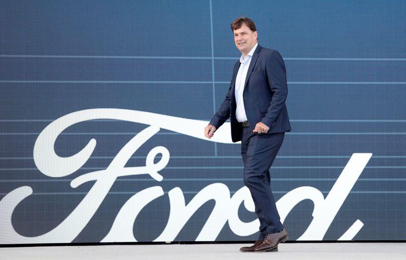 Ford CEO says carmaker now eyes making own EV batteries – Firstpost