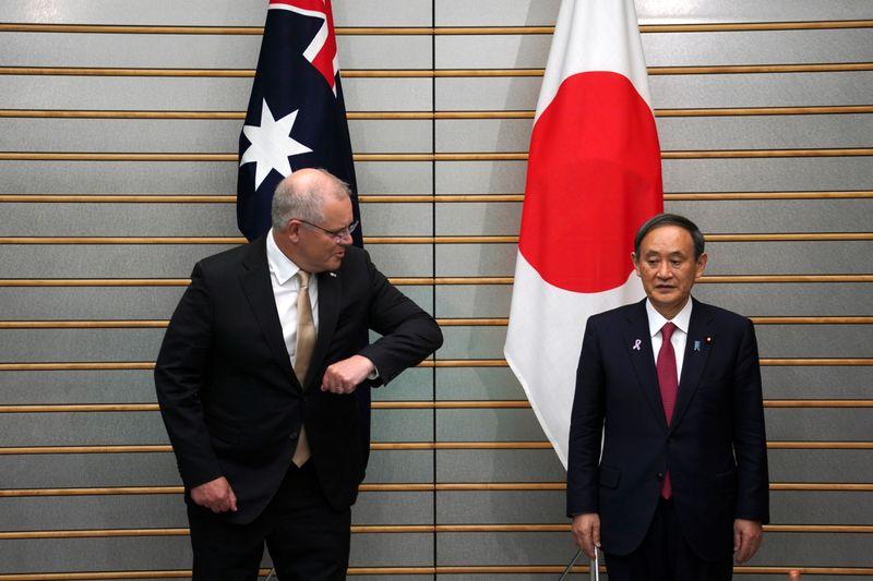 Japan Australia reach security pact amid fears over disputed South China Sea
