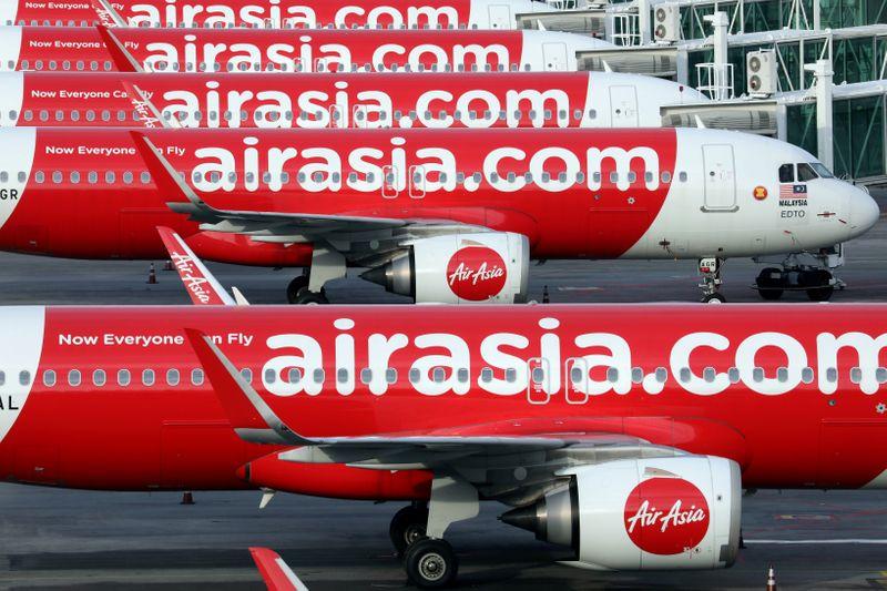 Malaysias AirAsia X posts larger loss as revenue hit by virus curbs