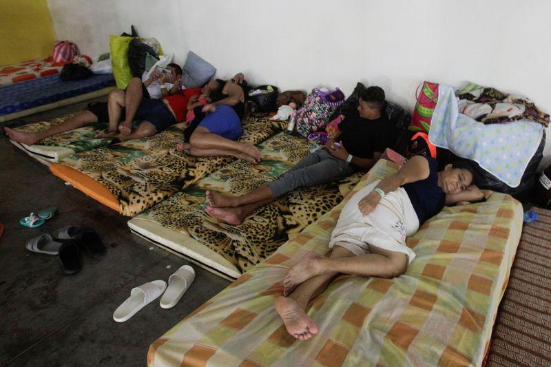 Hondurans who fled hurricanes now face coronavirus in overcrowded shelters
