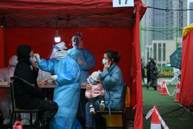 China reports 22 new coronavirus cases as Tianjin flags pig head link