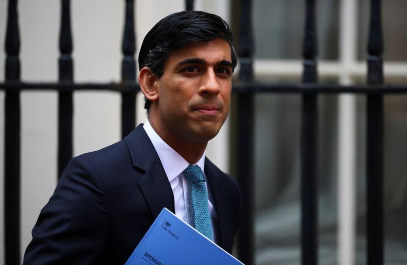 Minister resigns as UK cuts foreign aid spending commitment