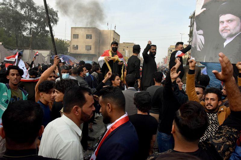 Three killed in clashes in Iraq after clerics followers storm protest camp