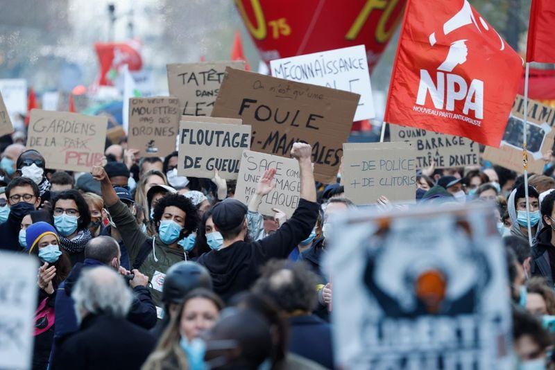 Protesters clash with police at Paris protest against police violence