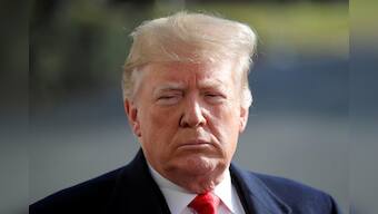 Trump defends Russia business dealings as U.S. probe widens