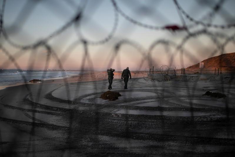 Tired of waiting for asylum, migrants from caravan breach U.S. border Tired of waiting for asylum, migrants from caravan breach U.S. border