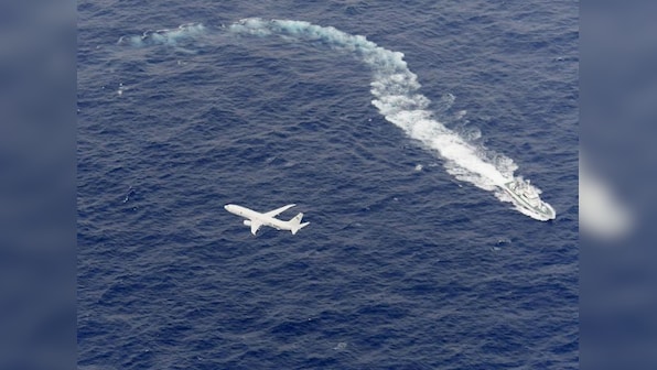 U.S. military air crash off Japan coast kills one Marine, five missing