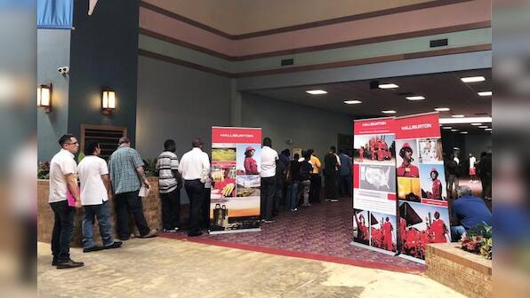 U.S. job growth slows in November, monthly wage gains modest