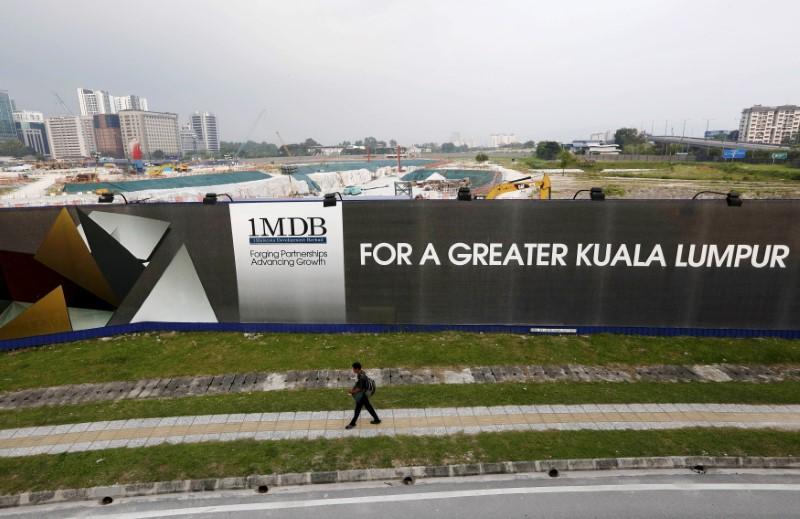 Malaysia charges another exGoldman Sachs banker over 1MDB