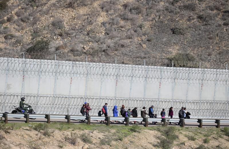 Corrected US to send migrants back to Mexico to wait out asylum requests