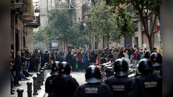 Police arrest Catalan separatists seething at Spanish cabinet visit