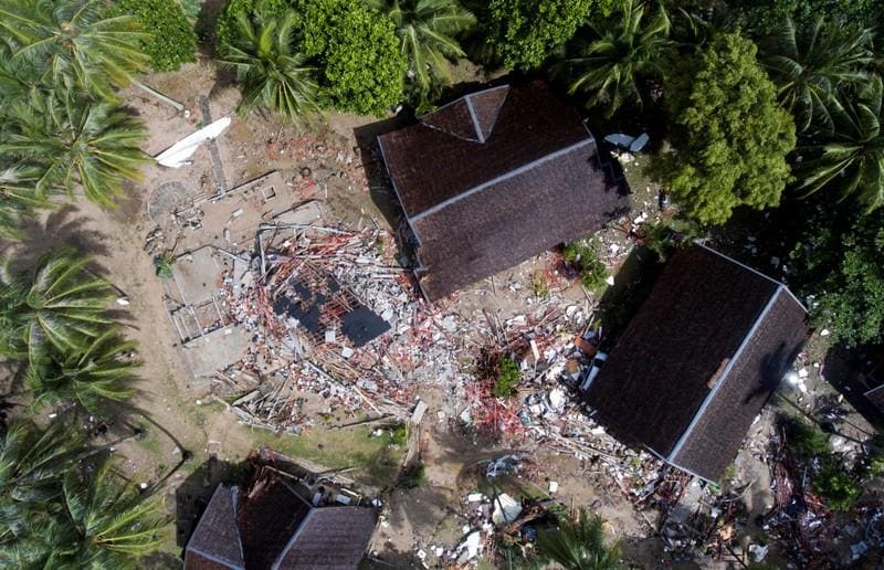 Indonesia hunts for survivors as volcano tsunami toll nears 400