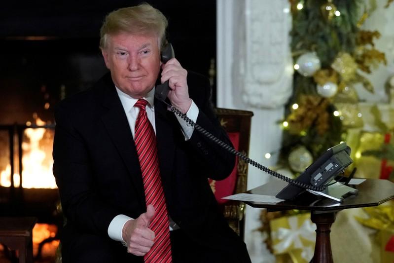 During gloomy Washington Christmas Trump takes kids Santa calls