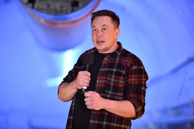 Tesla names close Musk friend Larry Ellison to board