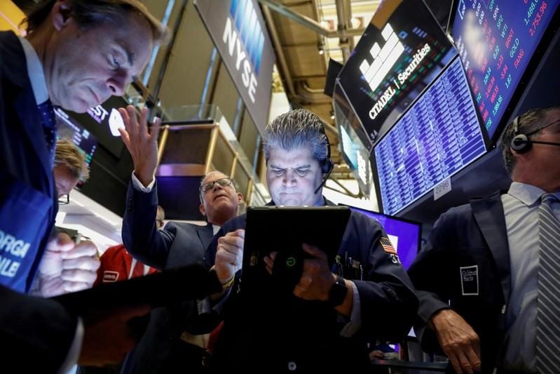 Wall Street falls on weak manufacturing data trade woes