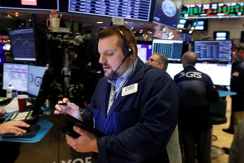 Dow falls as Boeing Home Depot weigh SP 500 Nasdaq cling to gains