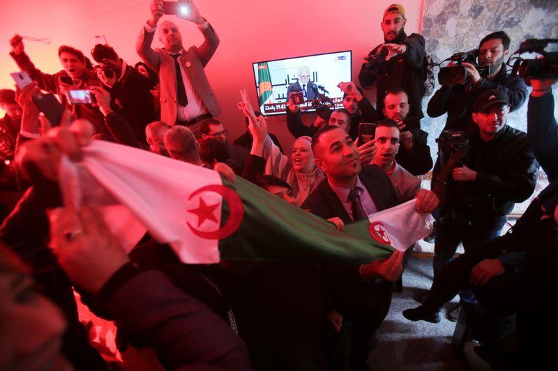 Expremier elected Algerian president thousands march in protest