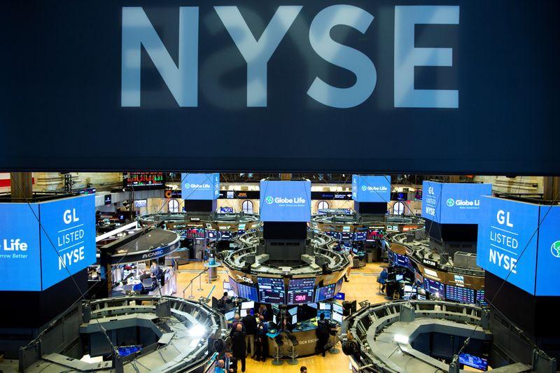 Wall Street sustains recordsetting climb on upbeat economic data