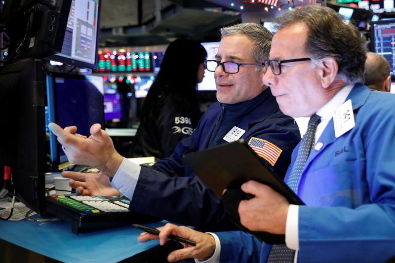 Wall Street rides trade optimism healthy consumer spending to record highs