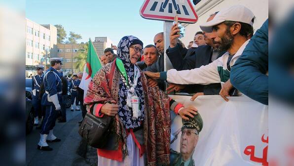 Hundreds of thousands turn out to mourn Algeria's powerful army chief