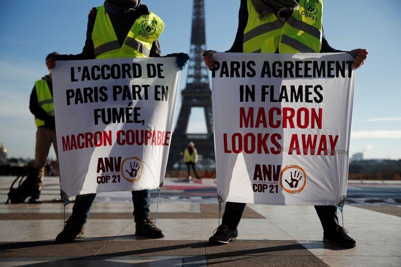 At home of climate accord in Paris campaigners demand action