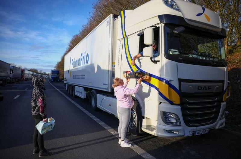 Britain says thousands of lorries cross Channel after virus testing stepped up