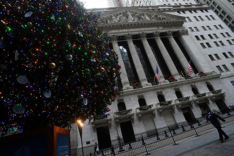 Wall St at record levels after Trump signs fiscal aid bill